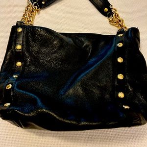 Gently used black leather Michael Kors shoulder bag.